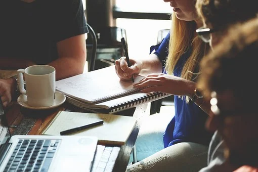 Group at a coffee shop working